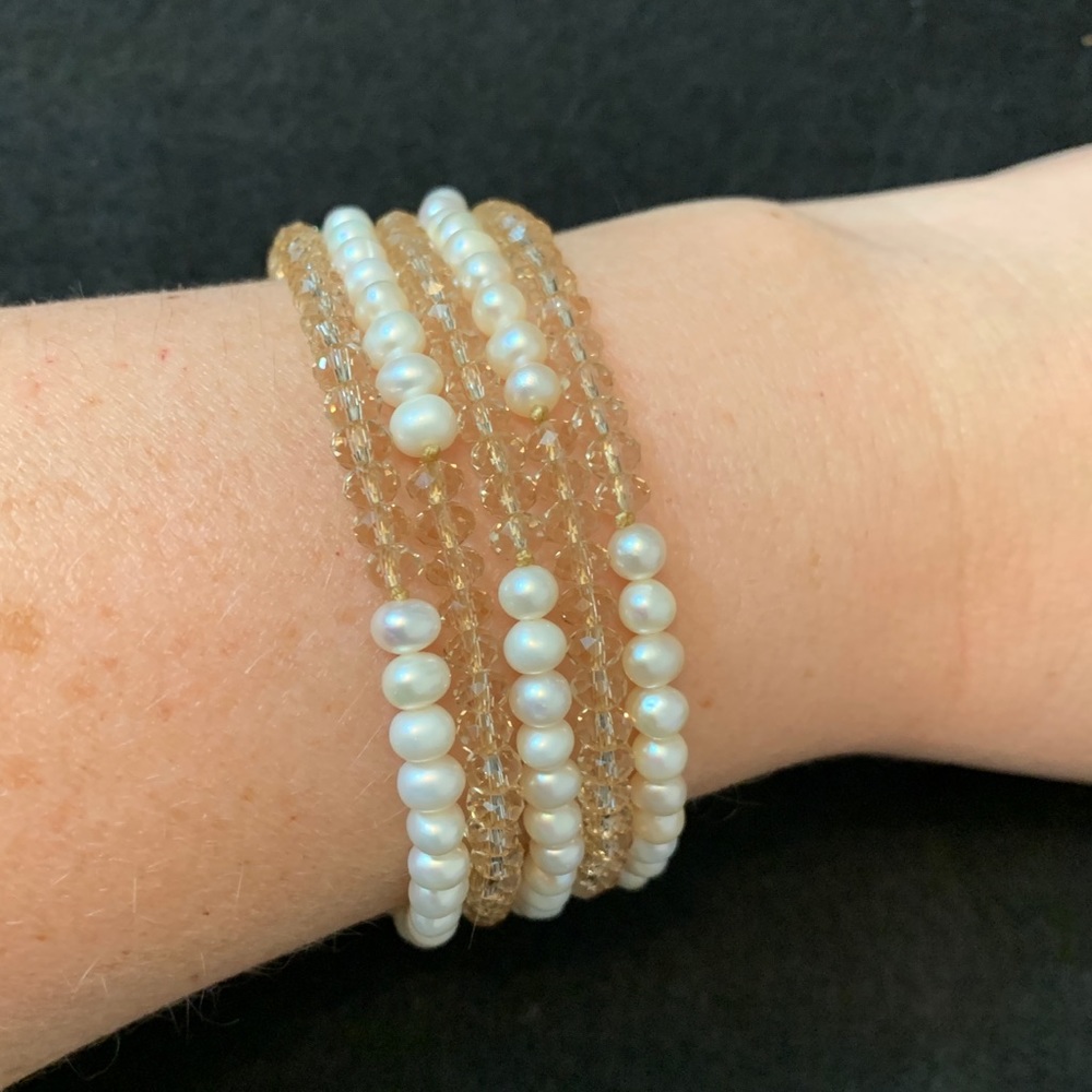 Beaded bracelet is faux freshwater pearl & crystal
